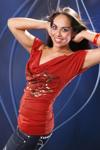 Brunette girl in red dress — Stock Photo, Image