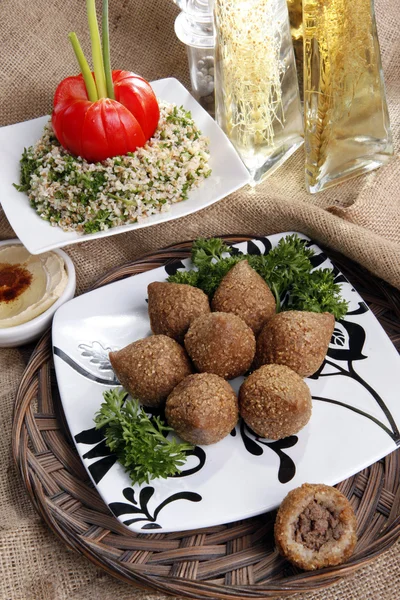 Fried Kibbe with Tabouli and Hummus Tahine — Stock Photo, Image