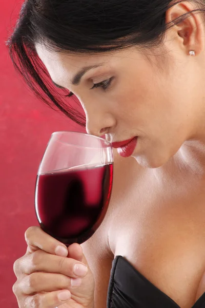 Woman drinking red wine in a glass — Stock Photo, Image