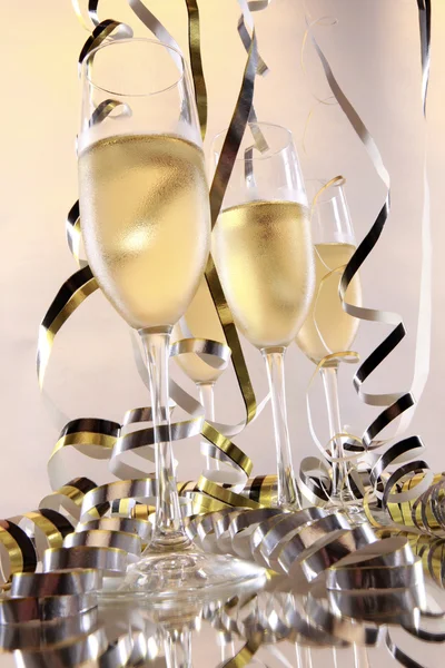 Champagne and curly serpentine — Stock Photo, Image