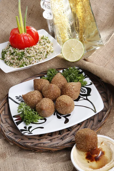 Fried Kibbe with Tabouli and Hummus Tahine — Stock Photo, Image