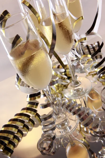 Champagne and curly serpentine — Stock Photo, Image