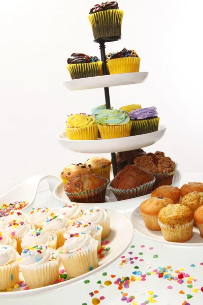 Trays of colorful assorted cupcakes — Stock Photo, Image