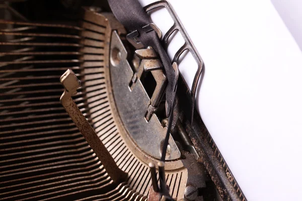 Old typewriter with a blank sheet — Stock Photo, Image