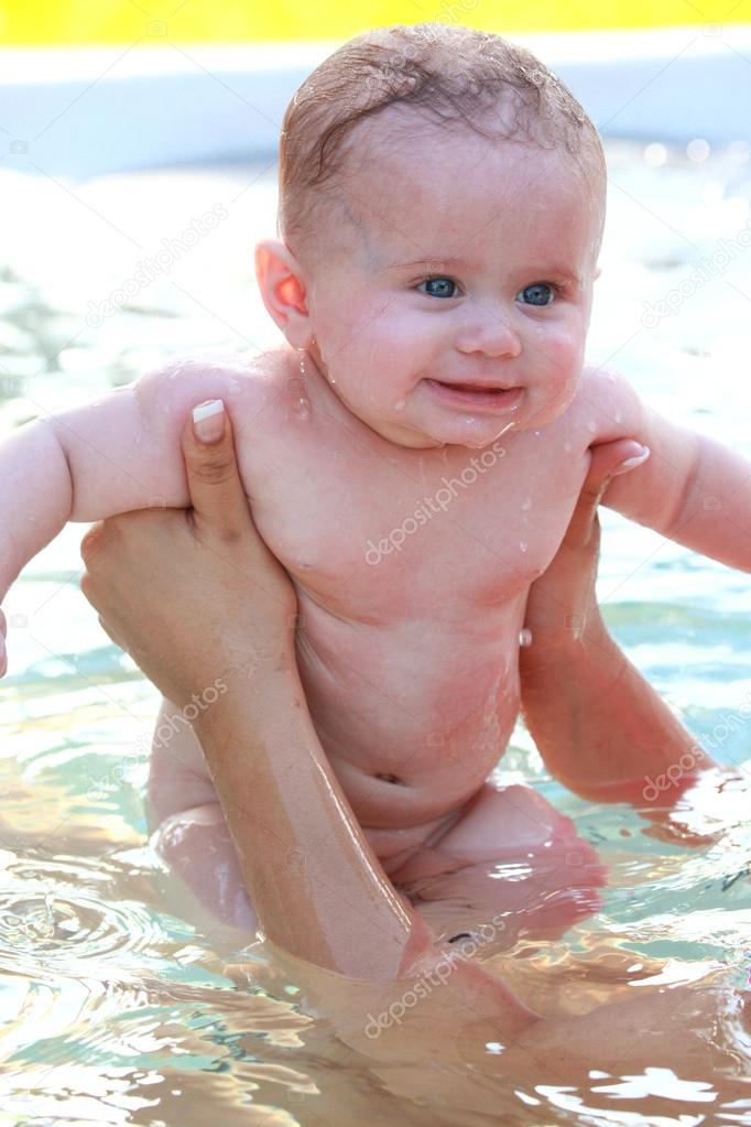 Baby girl in the pool