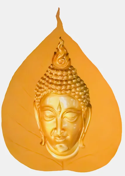 Gold Buddha head on a wooden stand in the form of plant leaf. — Stock Photo, Image