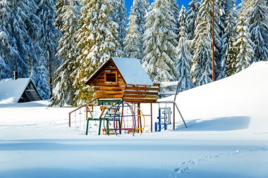 Game Childrens Complex in beautiful mountain snowy landscape. clipart