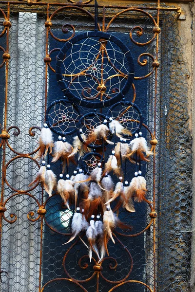 Dream Catcher and ornamental  window on background. Rust structure on old window — Stock Photo, Image