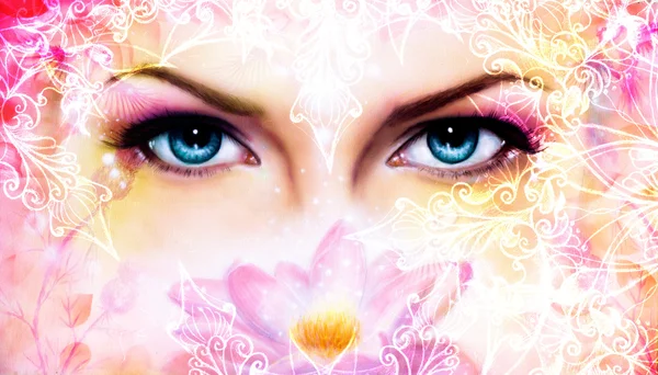 Blue women eyes beaming up enchanting from behind a blooming rose lotus flower, with ornaments — Stock Photo, Image