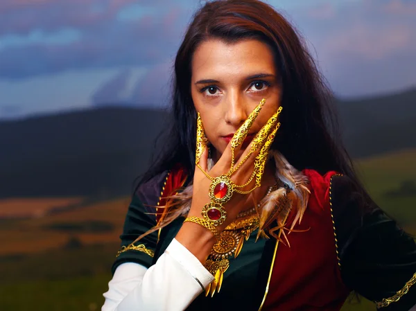 Smiling  Young woman with ornamental dress and hand jewel and finger jawel  Natural background — 스톡 사진