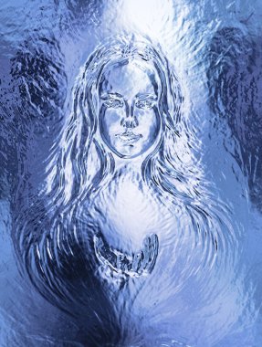 Woman goddess. Young attractive woman coated in metallic silver paint