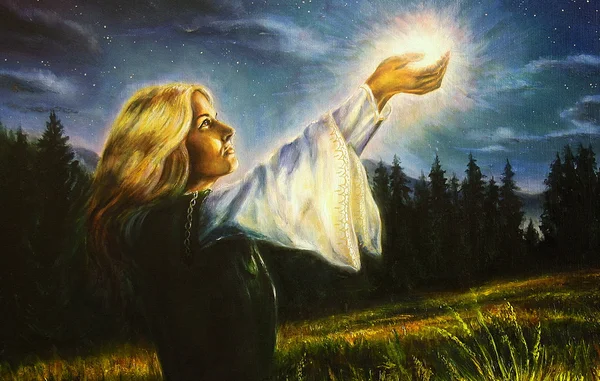 painting mystical young woman in green emerald medieval dress is holding a glowing ball of light in her palms amids a nocturnal meadow. profile portrait