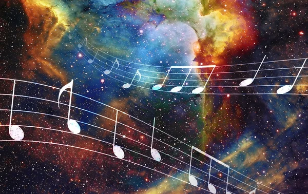 Note de musique et Espace et étoiles avec fond couleur abstraite . — Photo