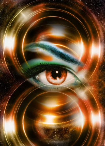 Woman eye and cosmic space, with light circle. — Stockfoto