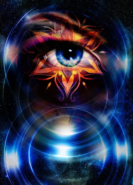 Goddess Woman eye and oriental ornamental mandala in cosmic space.