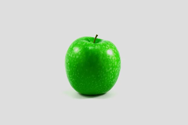 Jedno zielone jabłko na białym tle — Zdjęcie stockowe