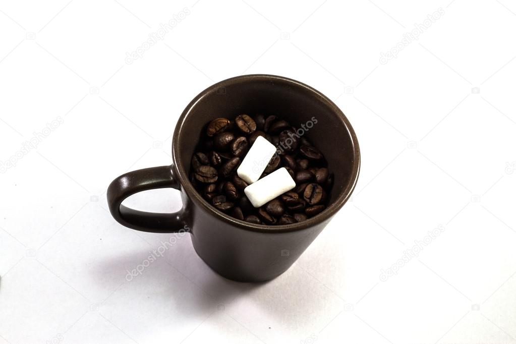Mug of coffee and chewing gum