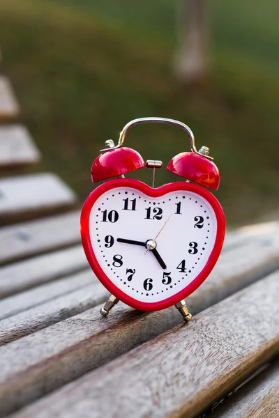 Metal clock in the shape of heart — Stock Photo, Image