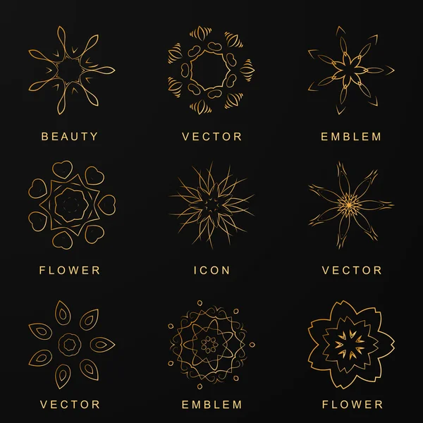 Абстрактные логотипы. Золотые иконы. Золотые абстрактные цветы для вашего десига — стоковый вектор