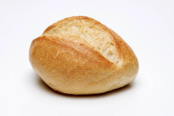 Een Fris Bruin Broodje Een Witte Geïsoleerde Achtergrond Dit Een — Stockfoto