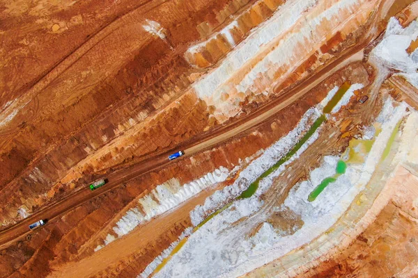 blue clay mining process in a quarry. drone photo. top view