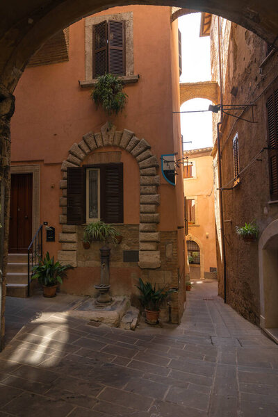 Narrow street of medieval town of Orte in Italy