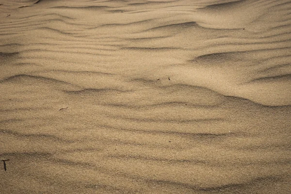 Zand op Simos strand — Stockfoto