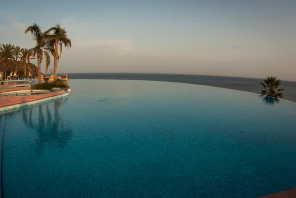 Pure pool with view to the sea — Stock Photo, Image