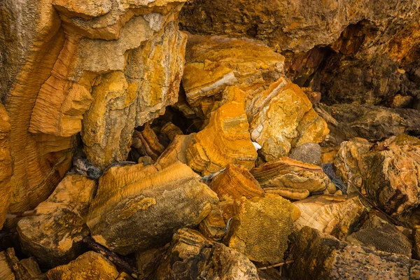 Rock formations on the beach in Loutra Edipsou — Stock Photo, Image