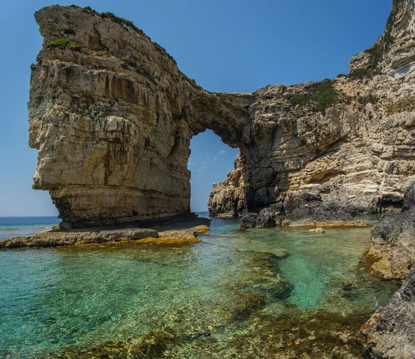 Arco único e cênico em falésias, Paxi — Fotografia de Stock