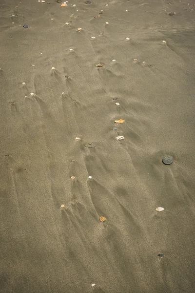 Zand en kiezels op het strand, Andros, Griekenland — Stockfoto