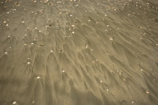 Písek a oblázky na pláži, Andros, Řecko — Stock fotografie