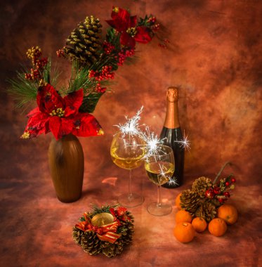 Christmas still life with sparklers, ornaments, champagne, tange clipart