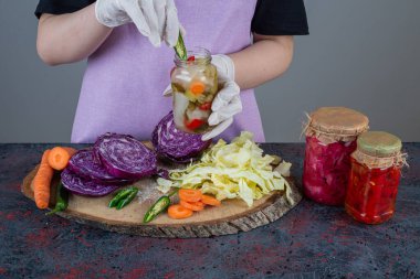 cropped view of woman cooking