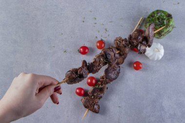 delicious grilled chicken kidneys on kitchen table