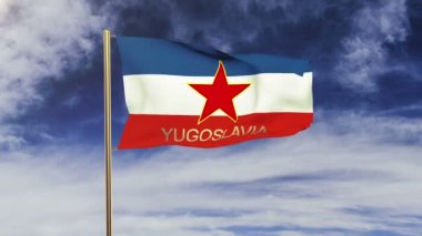 Yugoslavia flag with title waving in the wind. Looping sun rises style.  Animation loop