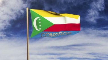 Başlığa sahip komor bayrağı rüzgarda sallanıyor. Döngülü güneş tarzı yükselir. Animasyon döngüsü