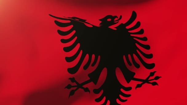 Arnavutluk bayrak rüzgarda sallayarak. Güneş döngü stil yükselir. Animasyon döngüsü — Stok video