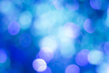 Mavi bokeh. Mavi arkaplanda bulanık ışık.