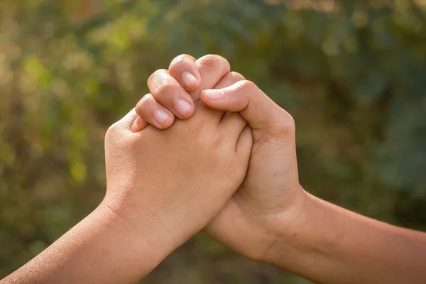 Partner hand on vintage background, Teamwork — Stock Photo, Image