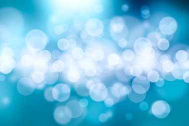 Mavi arkaplanda bulanık ışıklar ya da mavi arkaplanda ışıklar.