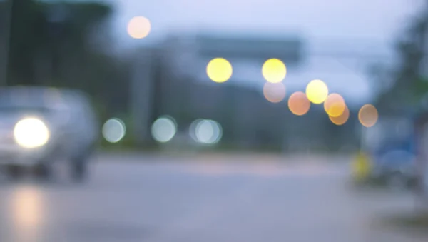 Defokussierte Stadt Nacht gefiltert Bokeh abstrakten Hintergrund. — Stockfoto