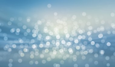Mavi arkaplanda bulanık ışıklar ya da mavi arkaplanda ışıklar.