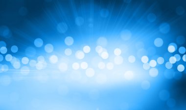 Mavi arkaplanda bulanık ışıklar ya da mavi arkaplanda ışıklar.
