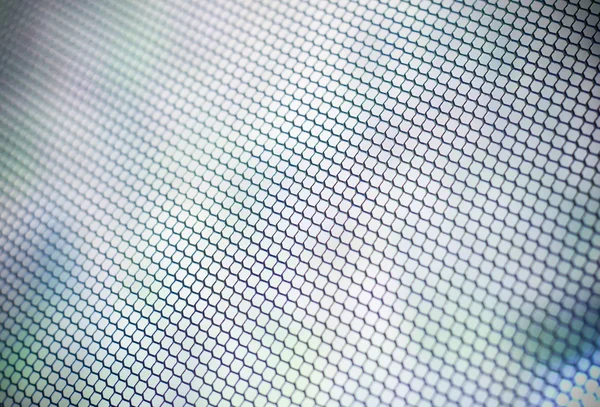 Blurred steel net filtered to blue colour. — Stock Photo, Image