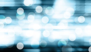 Mavi arkaplanda bulanık ışıklar ya da mavi arkaplanda ışıklar.