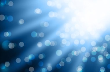 Mavi arkaplanda bulanık ışıklar ya da mavi arkaplanda ışıklar.