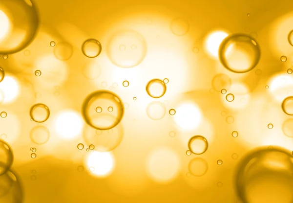 Mýdlové bubliny na zlaté pozadí, pozadí abstraktní. — Stock fotografie