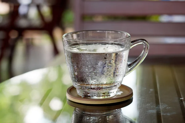Glass of drink water on coffee time. — Stock Photo, Image