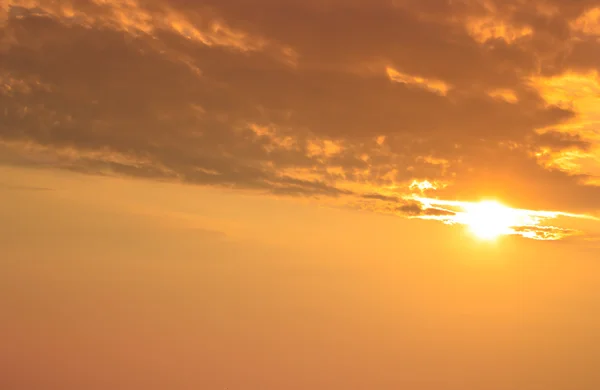 Gold light on sun set with cloudy.